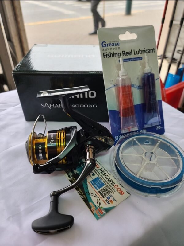 Carrete shimano Sahara 4000XG 11kg Spinning + lubricante + Multifilamento - Imagen 2